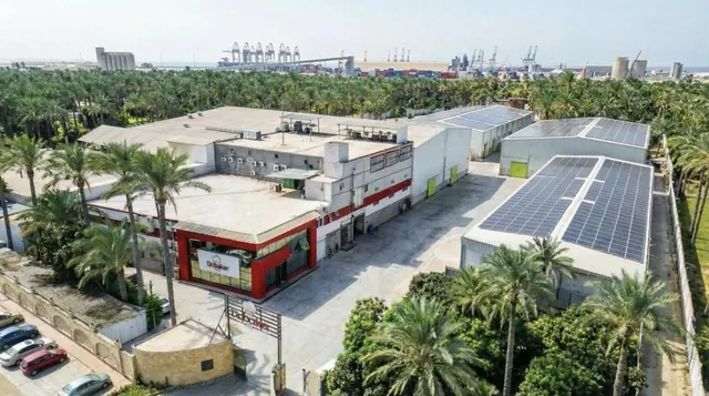 Aerial view of the Dr.Baker factory in Damietta with solar panels covering the roofs of the production halls
